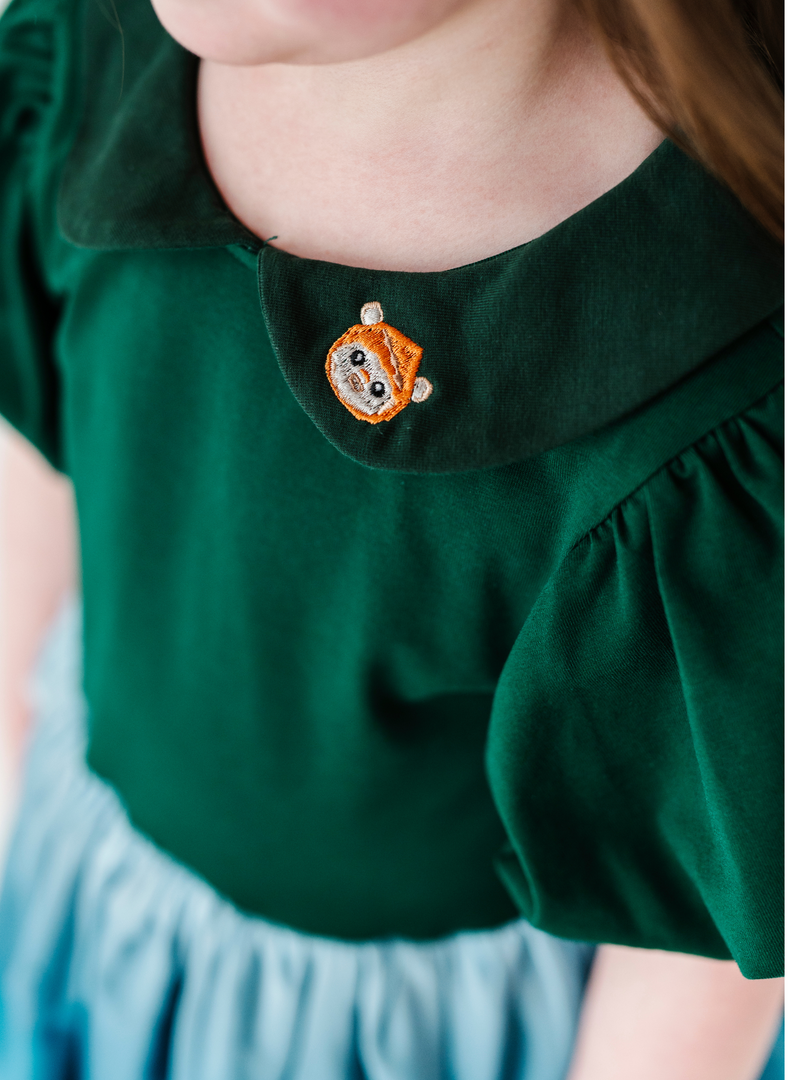 Featuring a cute Ewok-inspired design on the cute green collar.