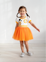 The orange and white combo of color makes for a jaw-dropping effect! Not to mention the puffed sleeves! It's a perfect match with our Resistance Roller Dress!