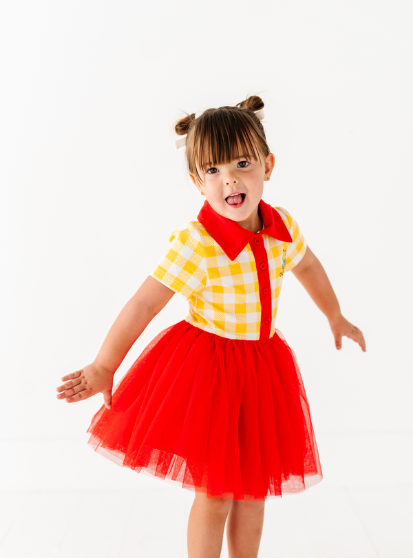Inspired by the loveable Winnie the Pooh, this dress has a sweet charm, featuring a fun design and bright colors!