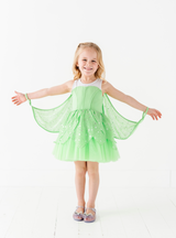 This dress is designed with many fun details and bright colors to really bring the fairy look!