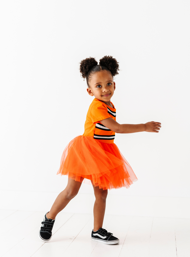This dress sure is to spark your little one's imagination with it's fun and vivid colors!