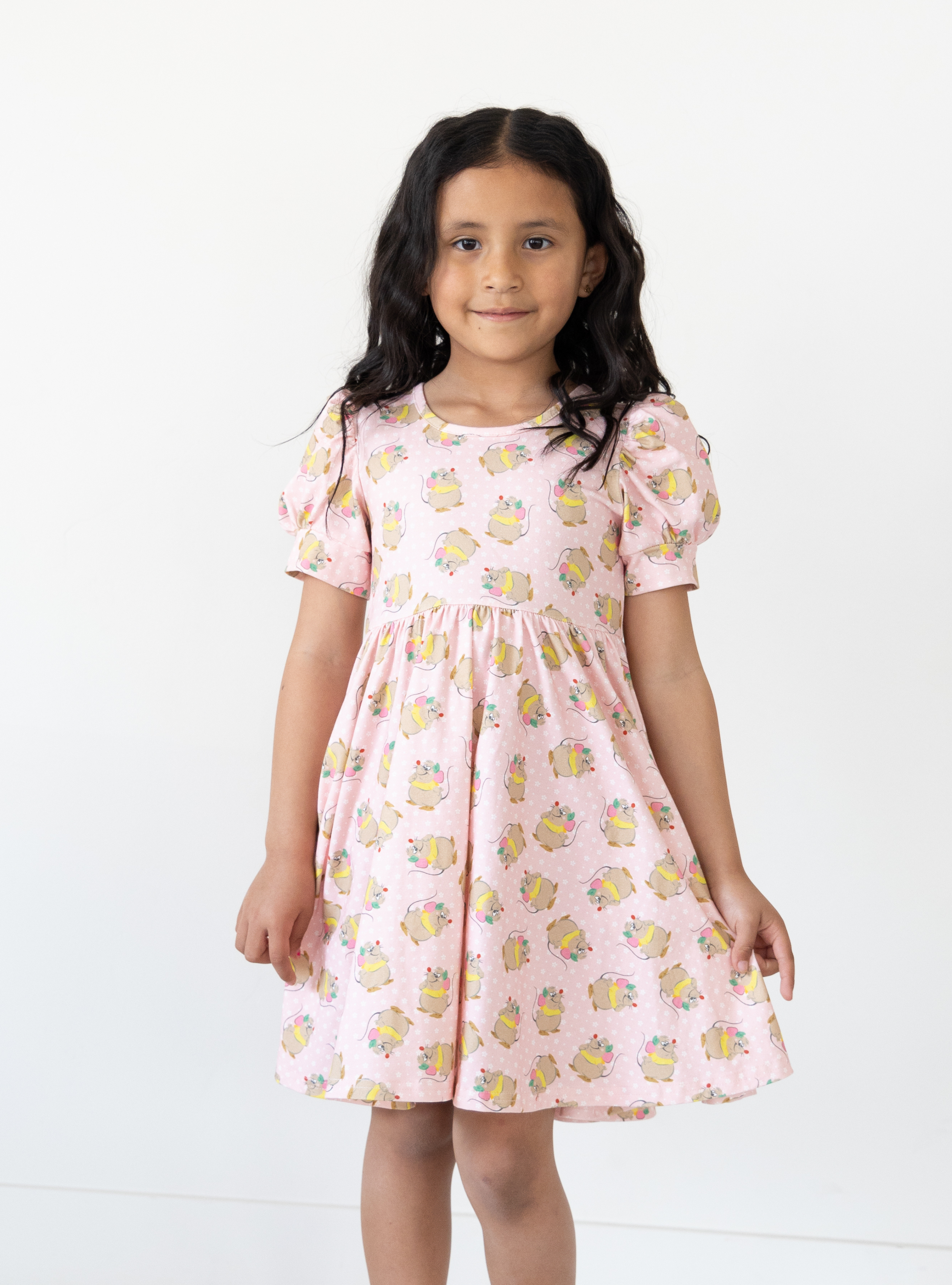 Disney and Taylor Joelle branded Gus Gus Dress with Gus Gus printed all around. This dress is detailed with puff sleeves.