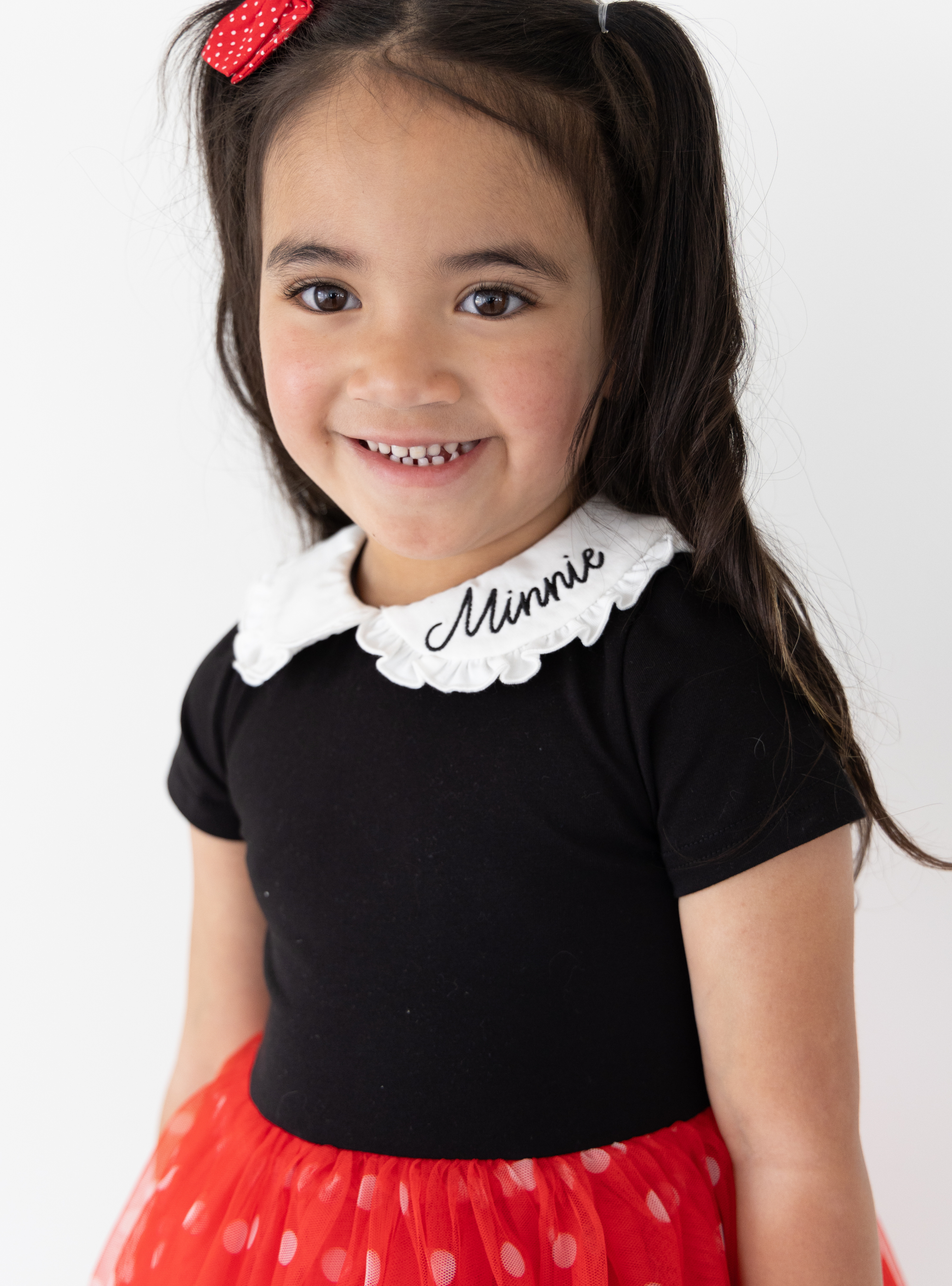 Disney and Taylor Joelle brand kids dress with polka dot print skirt, ruffle and embroidered collar, short sleeves, and soft tulle