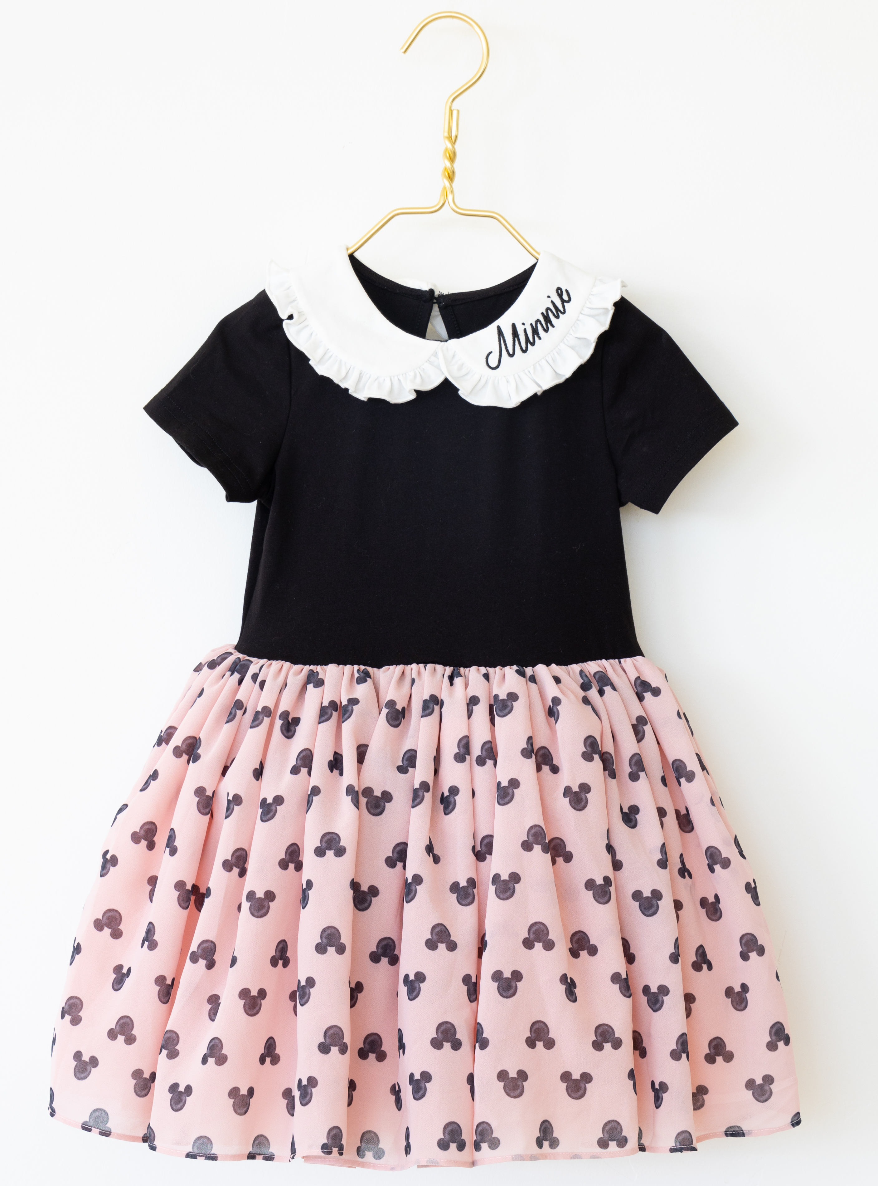 Disney and Taylor Joelle brand mickey mouse print on skirt of kids dress with ruffle and embroidered collar, short sleeves, and chiffon skirt