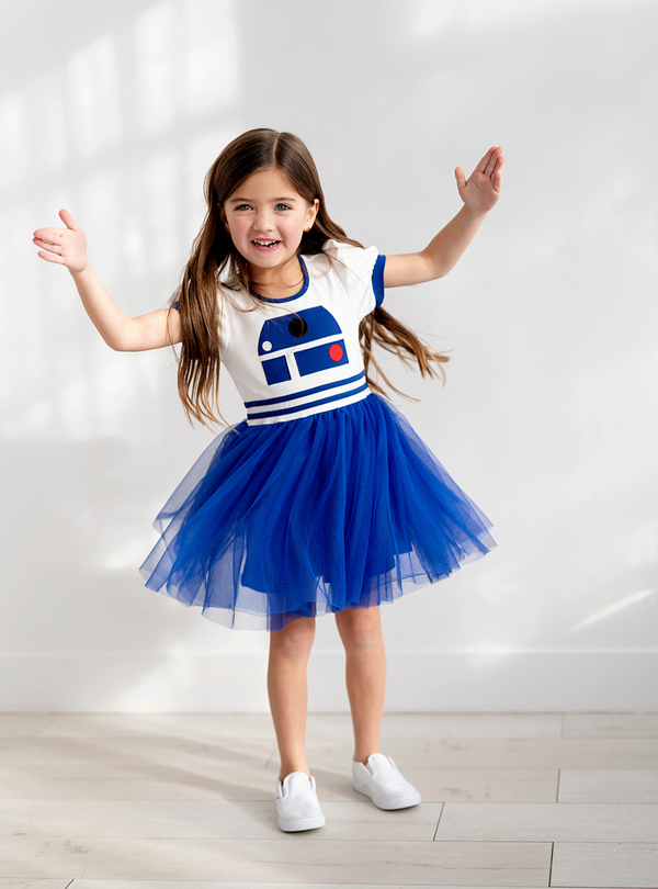 This R2D2-inspired dress is absolutely stellar!The blue and white color scheme is accented with bold details, creating a look that's both playful and instantly recognizable.