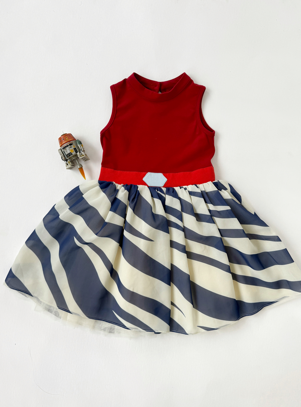 This Striped Warrior Dress is an Ashoka-inspired dress, with vibrant colors creating a bold look.