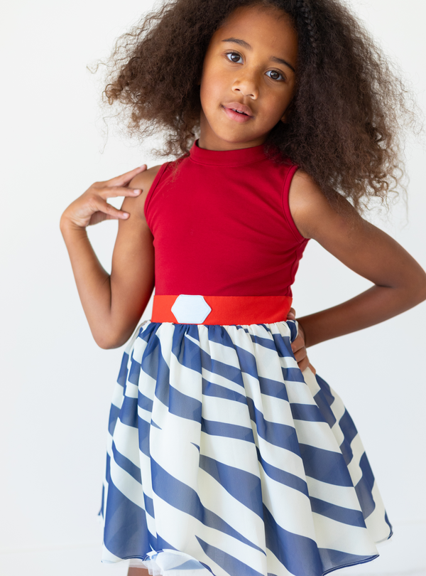 With bright and bold colors, The Striped Warrior dress is sure to catch your eye, with red, blue and cream colors to complete the look.
