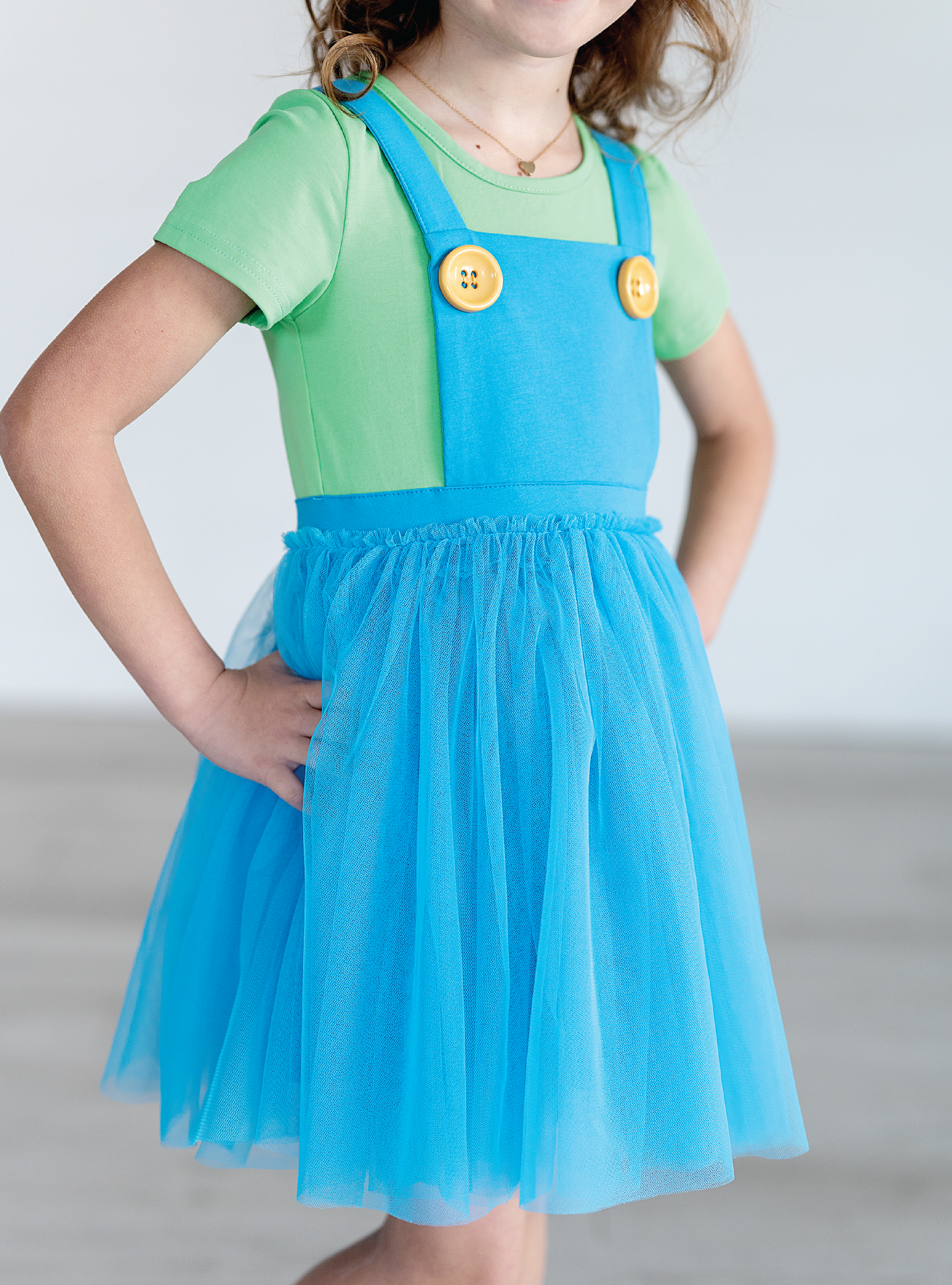 Along with the yellow accent buttons creating that signature overall look!