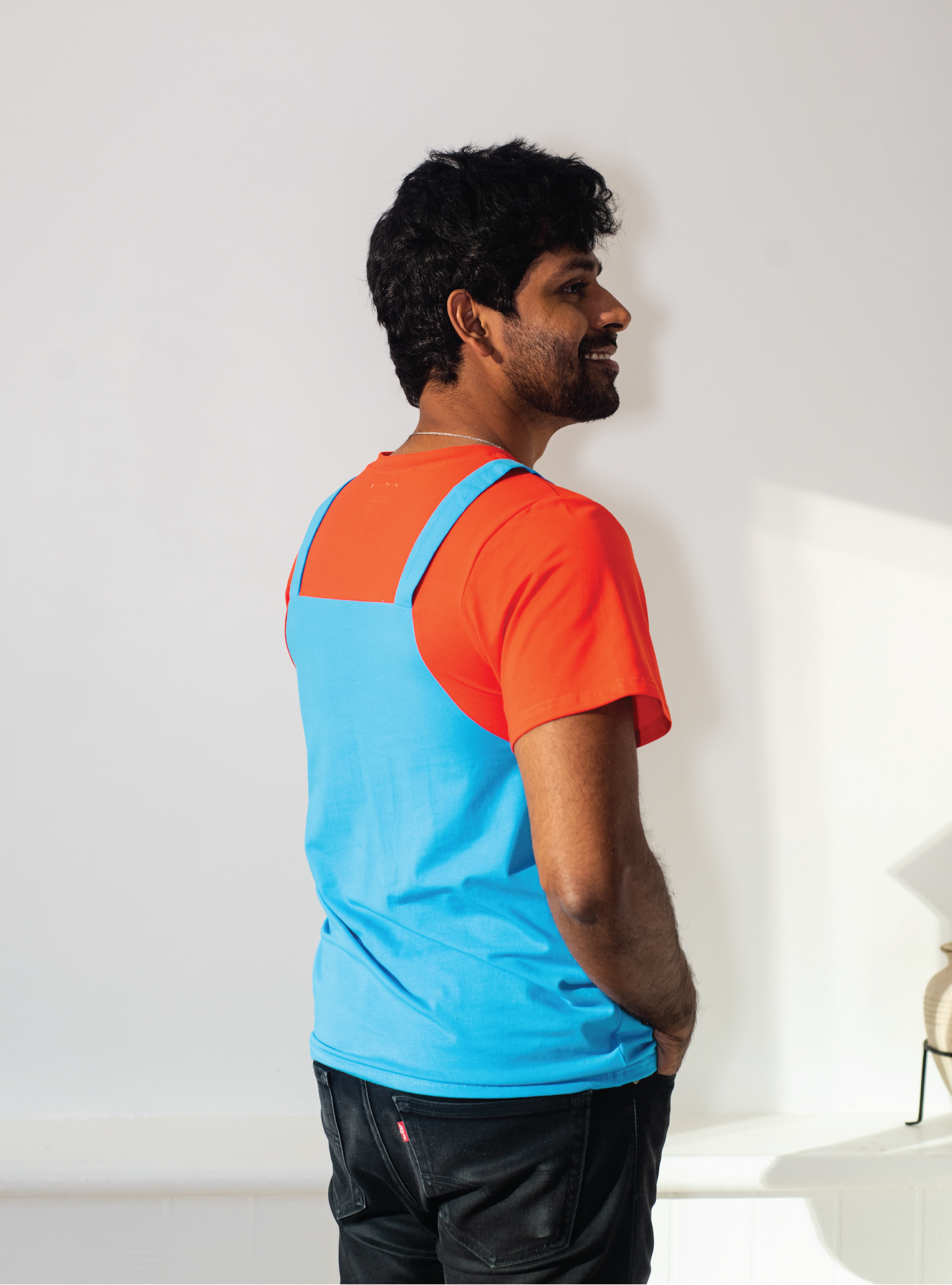 This Red Overall tee is the obvious choice when choosing outfits, and pairs wonderfully with our other Red and Green Overall dresses and tees!