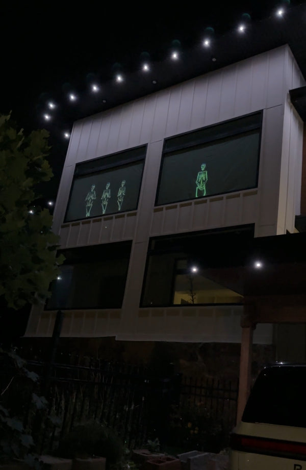 Our Favorite Way to Decorate for Halloween - Projecting Videos onto a Window