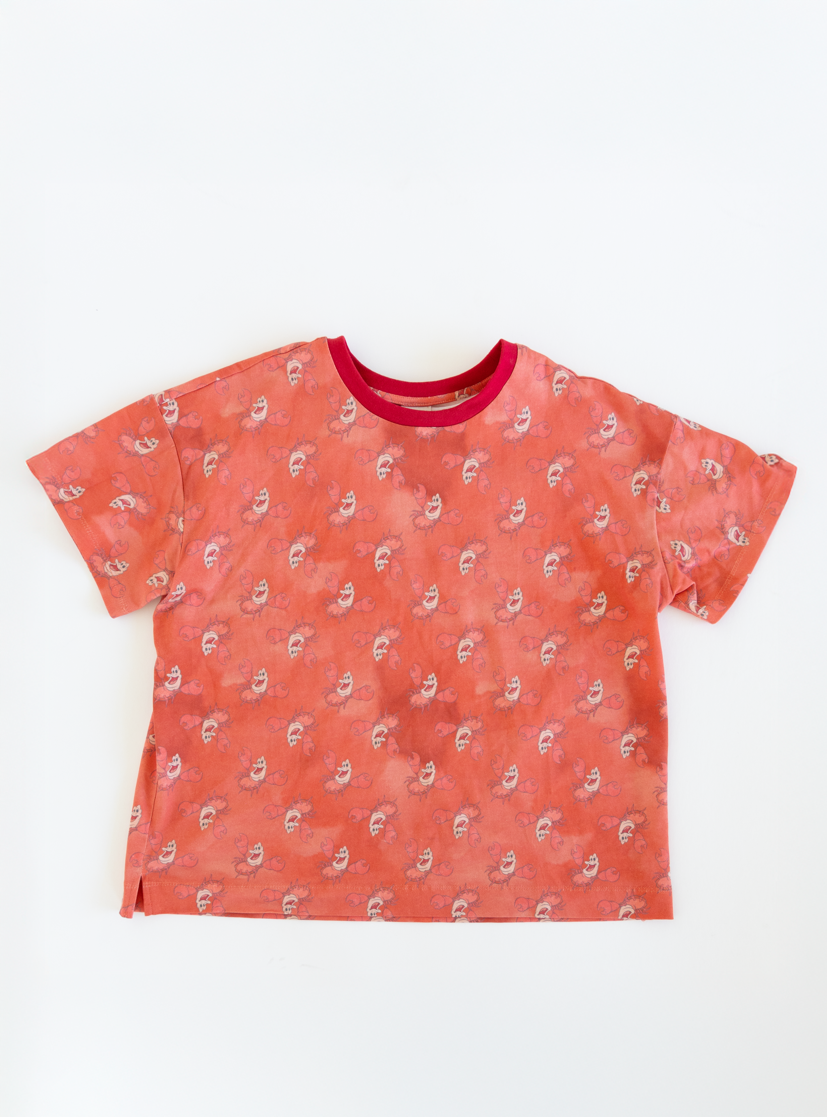Disney and Taylor Joelle branded Sebastian shirt print all around the adult tee Flat lay.