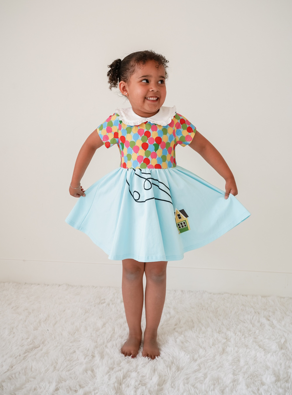 This Up-inspired dress features vibrant colors with an overall stunning effect.