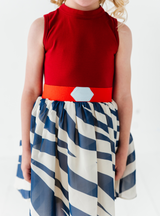 This dress has a fun design, complete with a sewn-on belt and a high-collared tank top.