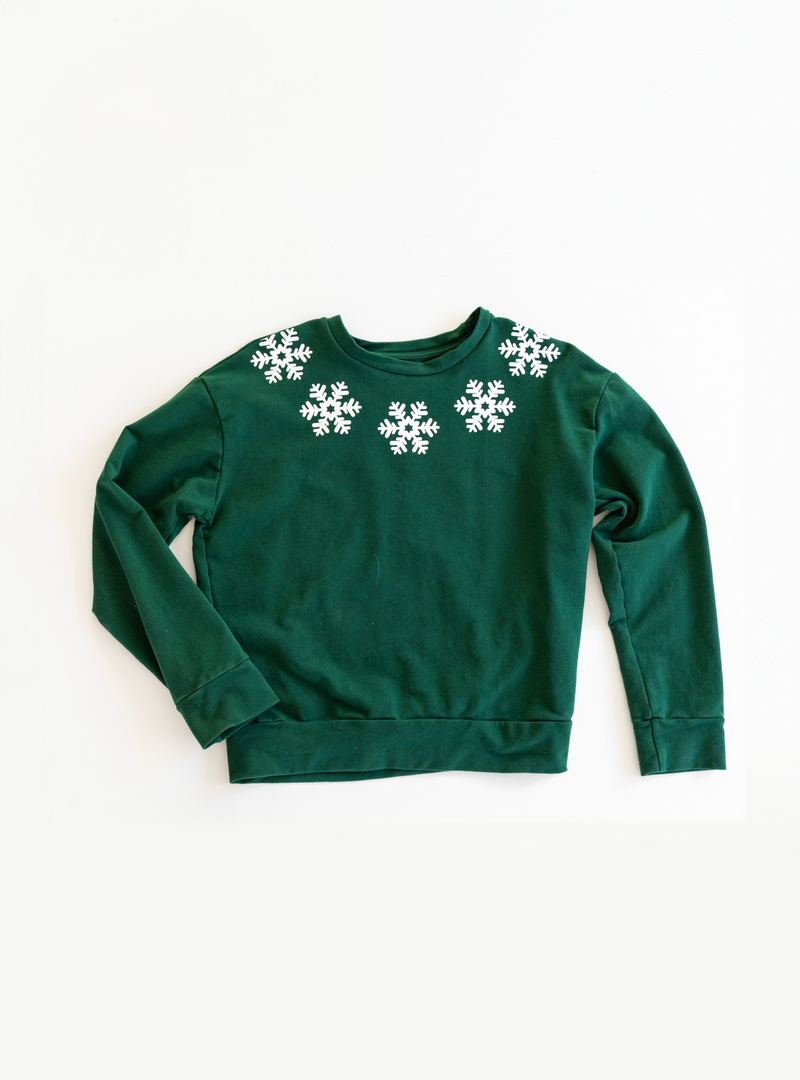 dark green adult crewneck with snowflake details