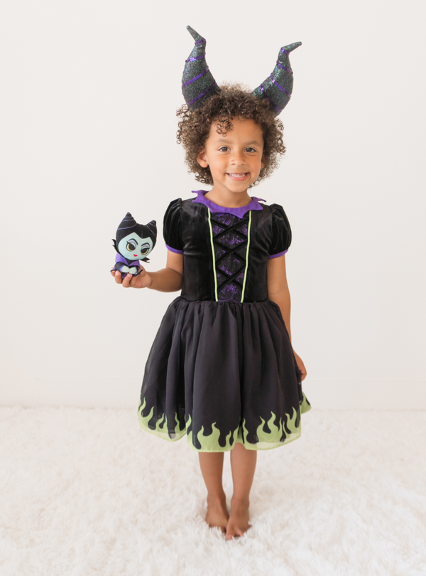 Features a fun purple collar with a velvet torso that includes a crisscross on the bodice.