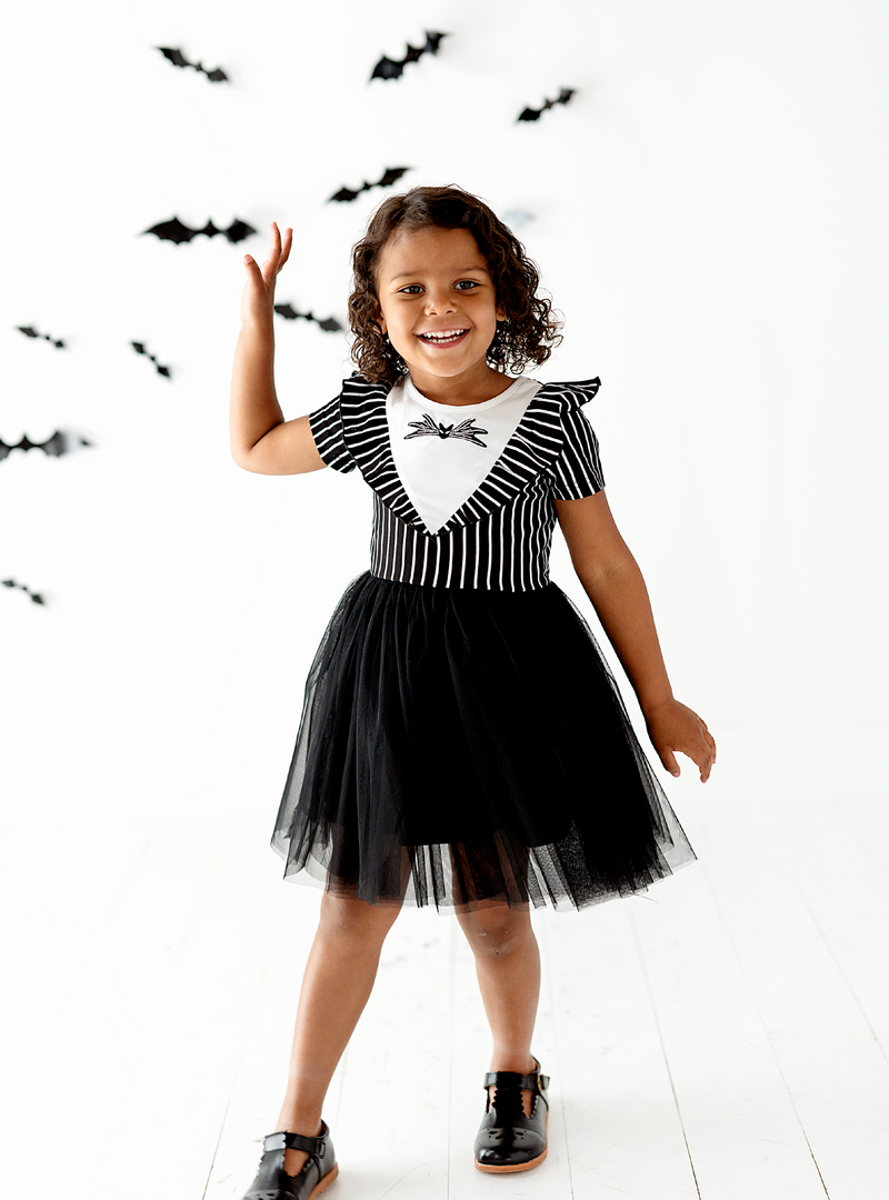 With it's black and white stripes, this dress is one that will catch your eye!