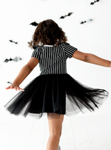 Featuring a tulle skirt and cotton bodice, this dress is made for comfort!