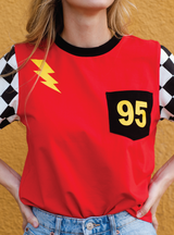 Featuring a lightening bolt on the bodice and a "95" on the pocket, it's safe to say this tee has all the details!