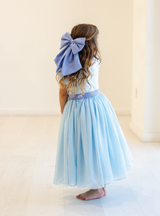 This dress features a longer skirt for a cute and dreamy effect! Not to mention the sweet bow as an added bonus!